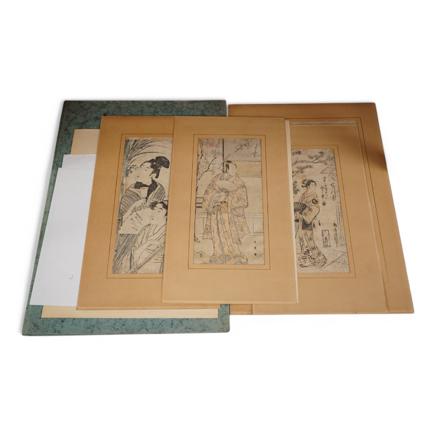 Four Japanese woodblock prints to include works by Torii Kiyotsune, Kitagawa Utamaro and Ichiarkutei Eisui, Women wearing kimonos and kabuki actors largest 37 x 24cm, mounted, unframed. Condition - fair